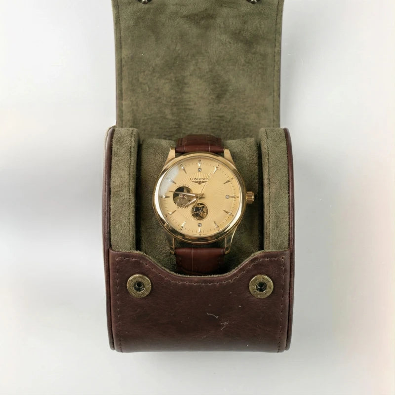 Relogio Fabbricantti masculino dourado com esqueleto mecanico estojo porta-relogios couro marrom visao superior fundo branco Fabricanti relogio automatico caixa redonda presente embalagem